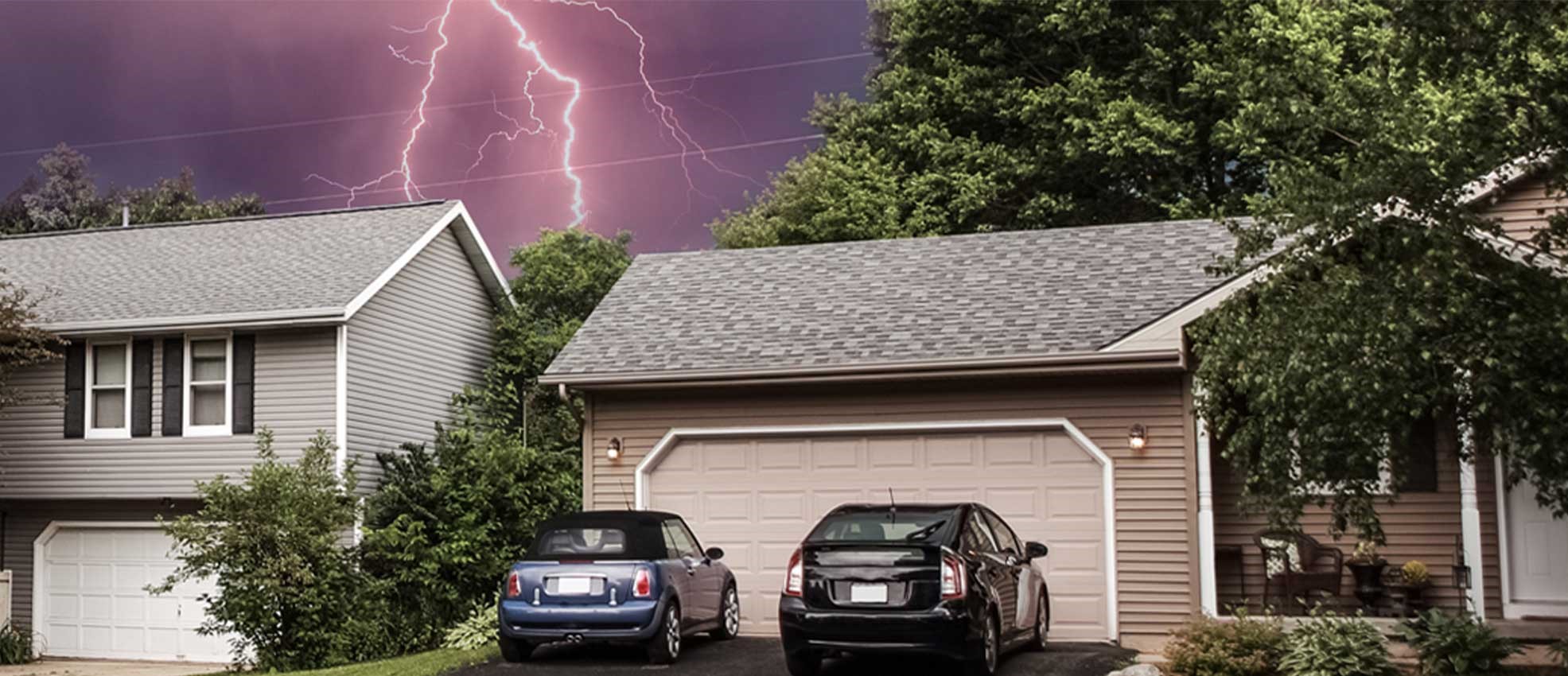 homes with lightning in background